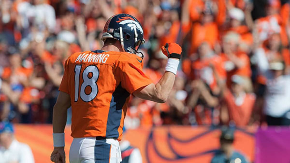 Manning throws for 3 TDs in Broncos' 30-23 win