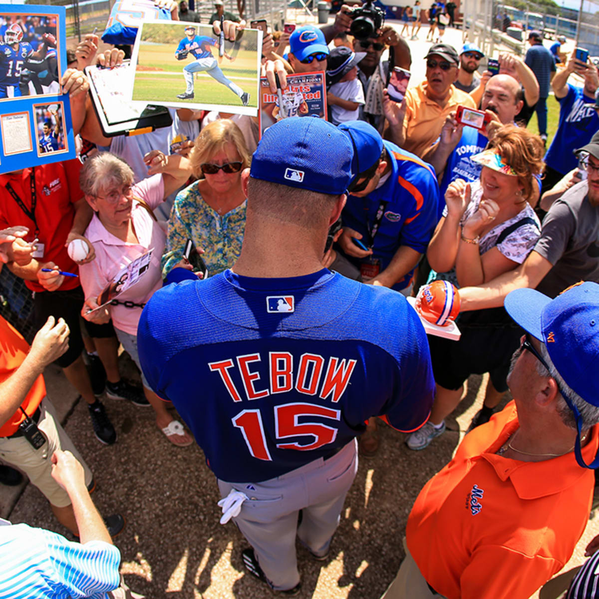 Tim Tebow prays over fan suffering from seizure after first