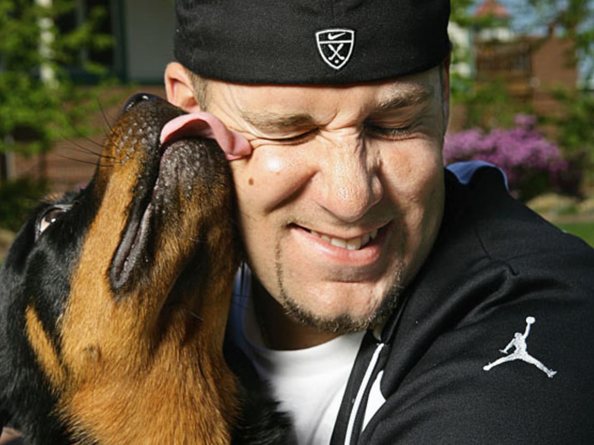 Photos: Athletes and their dogs