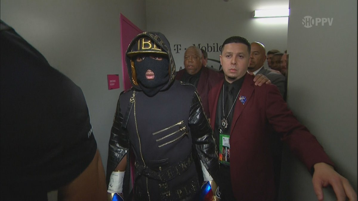 Floyd Mayweather walks out to ring in a ski mask (Video)